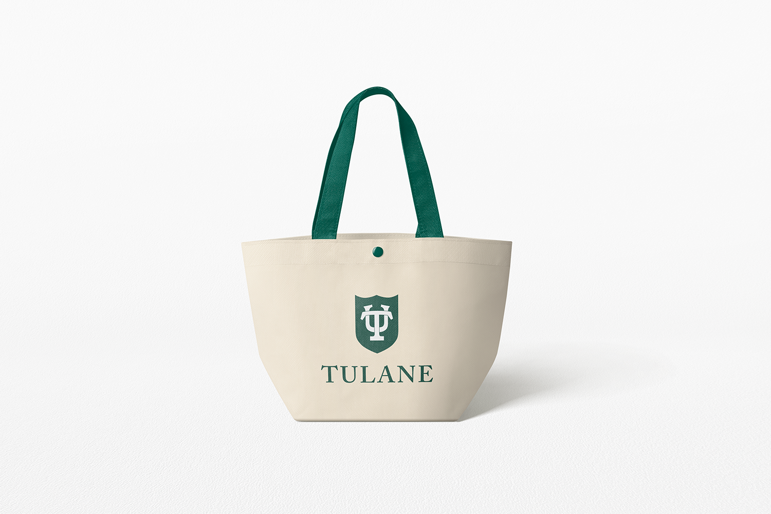 Beige tote with white Tulane logo on green shield above Tulane wordmark on the front